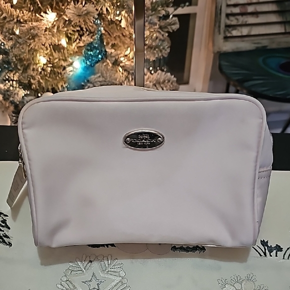 Coach Handbags - Coach Light Neutral Cosmetic Pouch